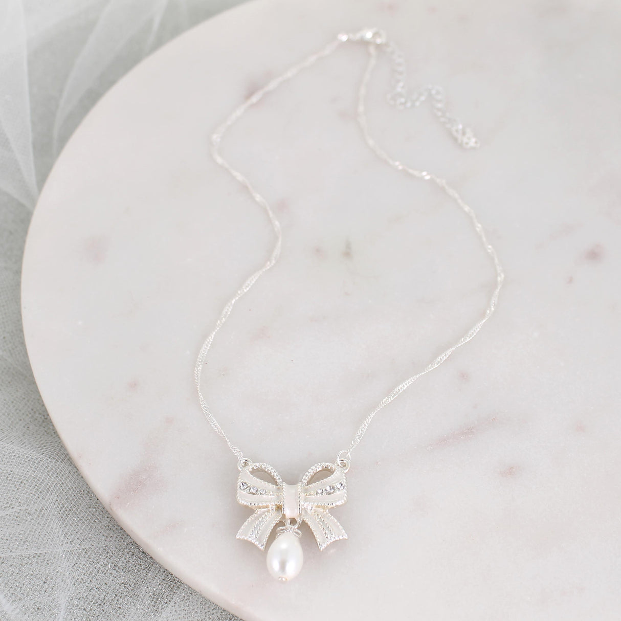 Crystal Bow w/Dangle Pearl Necklace
