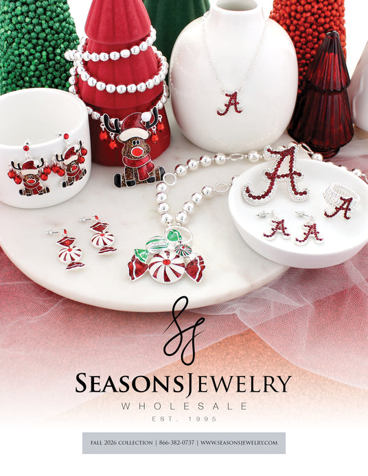 SJ Catalog Cover - a vignette of reindeer, peppermint, and crystal Alabama jewelry pieces set on vases and trinket dishes.