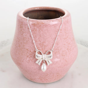 Crystal Bow w/Dangle Pearl Necklace