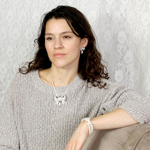 Crystal Bow w/ Dangle Pearl Pendant